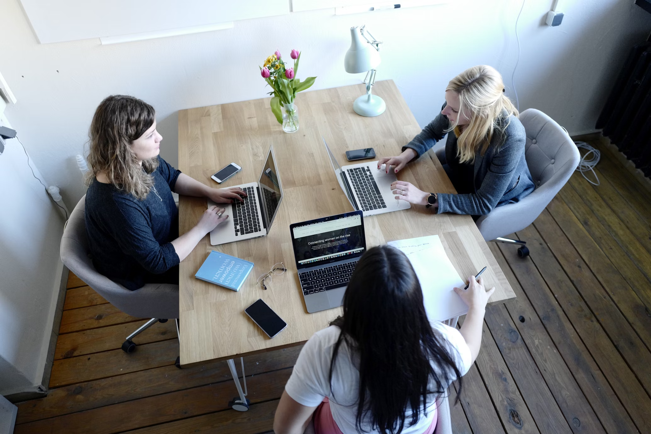 Team working together around a table